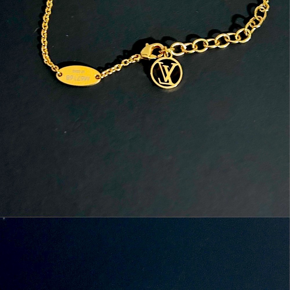 Louis Vuitton Gold Bracelet with Signature Charm